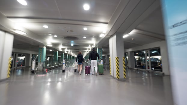 Seoul, South Korea, 2020 - Travelers walking in airport photo