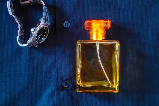 Perfume with shirt and wristwatch photo