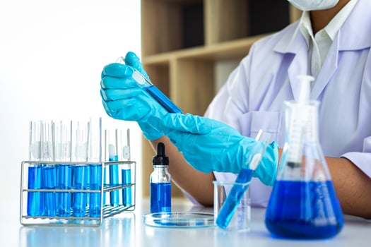 Medical laboratory with droppers, test tubes, and beakers photo
