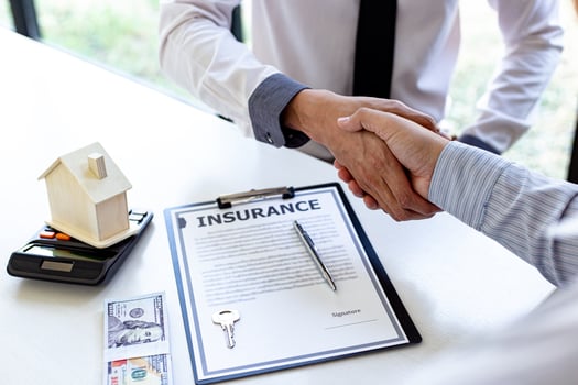 Signed insurance contract photo