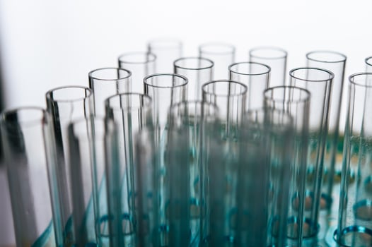 Science tubes arranged on a shelf photo