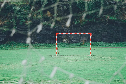 Ripped net on soccer goal photo