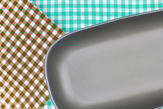 Round rectangular plate on cloth photo