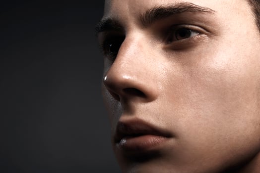 Closeup look of handsome young man photo