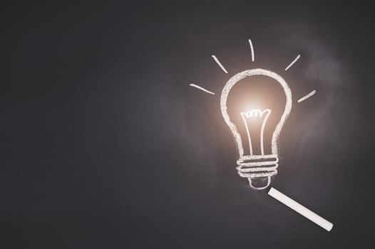 Light bulb symbol on the blackboard photo