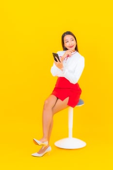Young asian woman with smart mobile phone photo