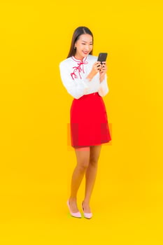 Young asian woman with smart mobile phone photo