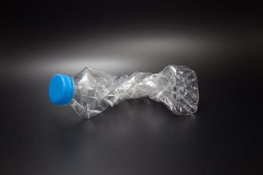 Crumpled plastic bottle photo