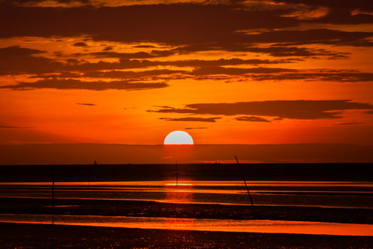 Red sunset at the beach photo