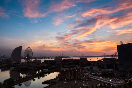 Silhouette of a city at sunset photo