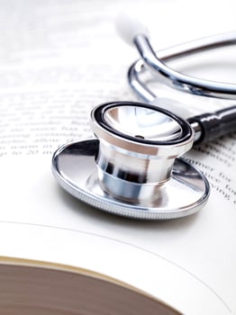 Stethoscope on a textbook photo