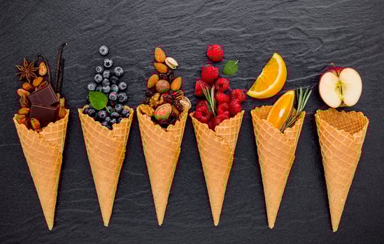 Fruit and nuts with ice cream cones photo