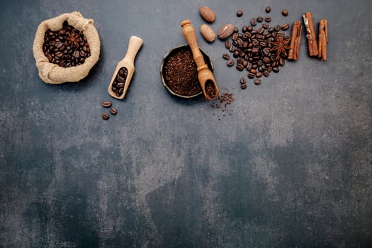 Coffee beans on a dark gray background photo