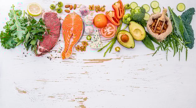 Healthy diet ingredients on a shabby white background photo