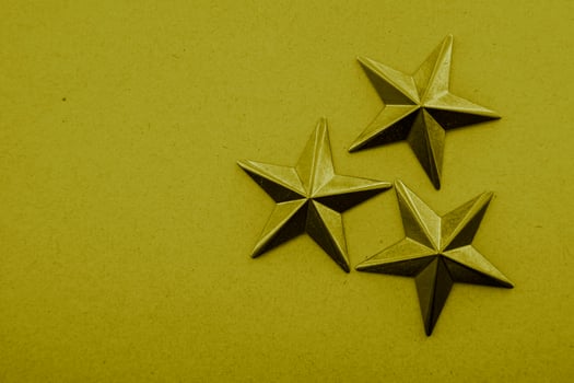 Yellow stars on the yellow background photo