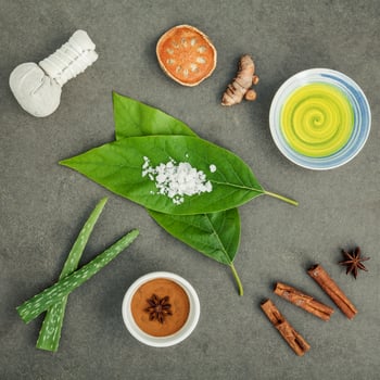 Natural spa items on gray background photo