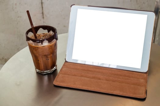Mock up tablet in a cafe photo