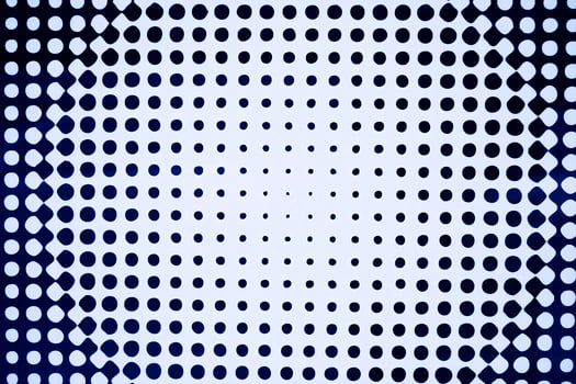 The texture of a white background with black circles of different sizes photo