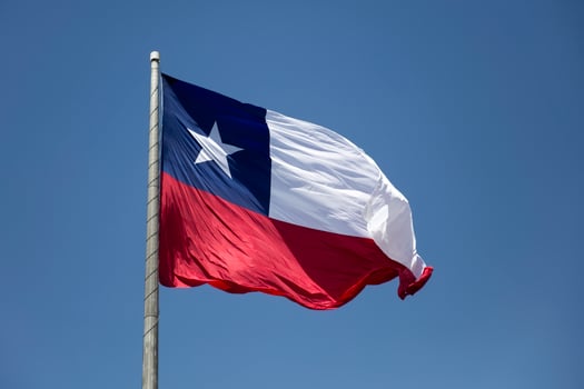 Chilean flag under blue sky photo