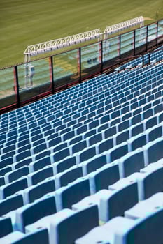 Closeup detail of the blue stadium seats photo