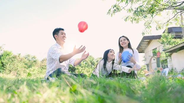 Asian family portrait with balloons photo