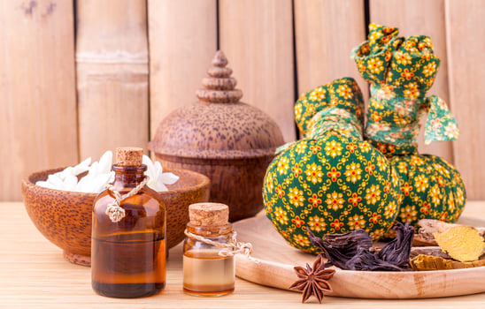 Herbal spa treatment with compresses photo