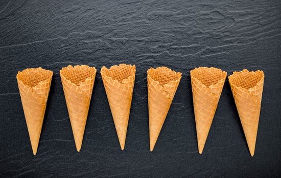 Waffles cones on a dark background photo