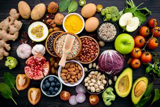 Pile of healthy food on a dark background photo