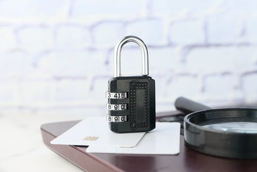 Black pad lock on a credit card, internet safety concept photo