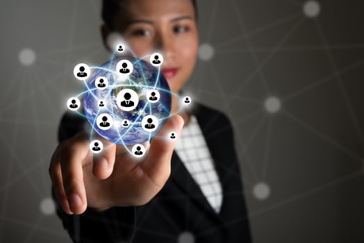 Business woman touching modern technology interface with 3D icons photo