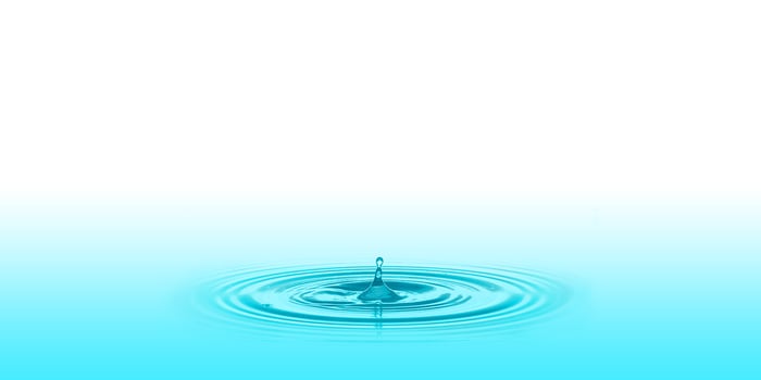 A drop of blue water on the surface of the water, 3D illustration photo
