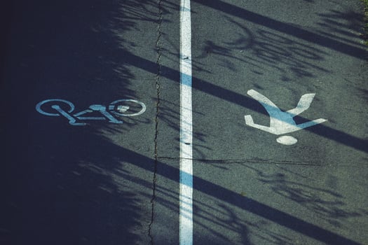 Bicycle and pedestrian road sign on the road photo
