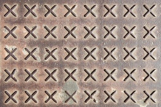 Texture of rusty metal floor plate with bumped pattern photo