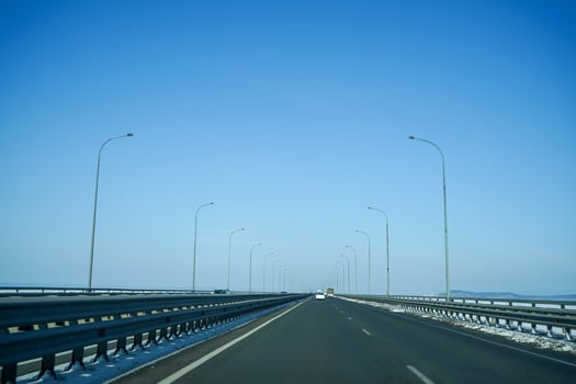 Landscape from Amur Bridge with clear blue sky in Vladivostok, Russia photo