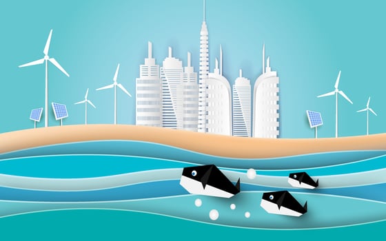 Whales swim in the sea with Buildings on the beach. Paper art style. vector