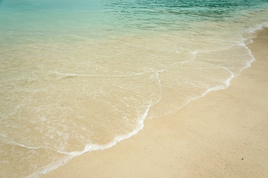 Tropical beach waves photo