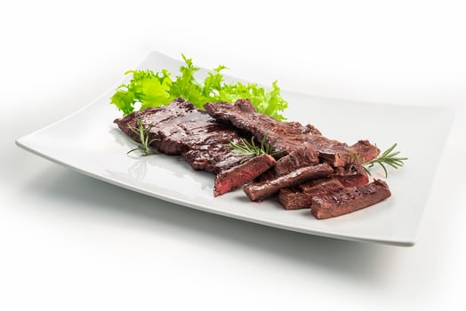 Meat dish skirt steak and salad photo
