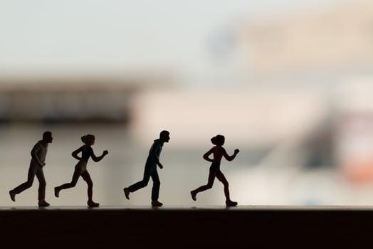 Silhouette of miniature people running, health and lifestyle concept photo
