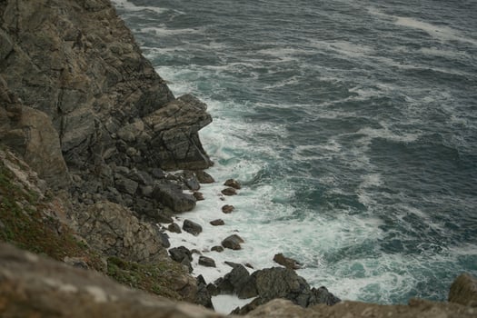 Seascape with waves crashing on rocks photo