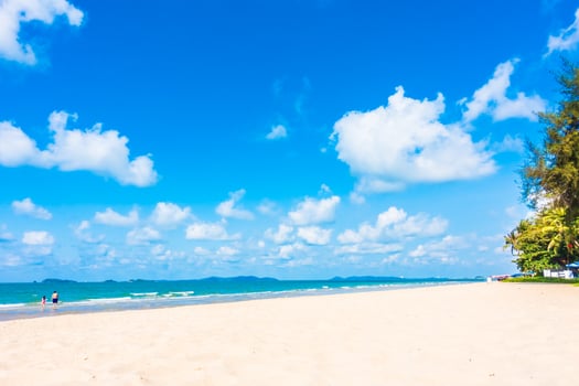 Umbrella and chair on the beach photo
