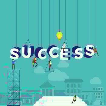 Team hard at work constructing the word SUCCESS vector