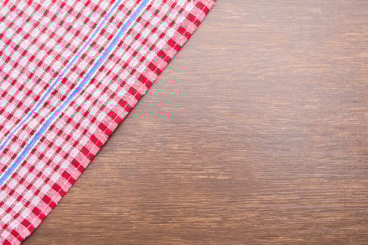 Tablecloth on wooden background photo