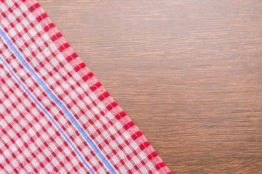 Tablecloth on wooden background photo