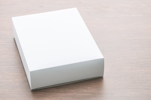 Paper box on wood background photo
