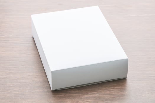 Paper box on wood background photo