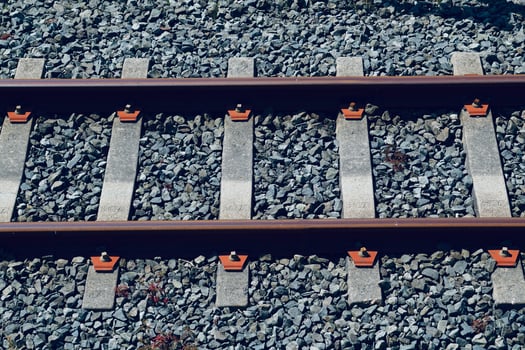Train railroad tracks in the station photo