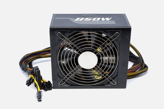 Computer power supply fan 850 watt with cable for ATX full tower case isolated on white background photo