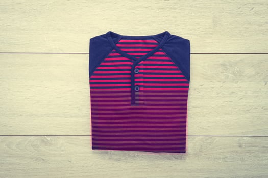 Shirt on wooden background photo