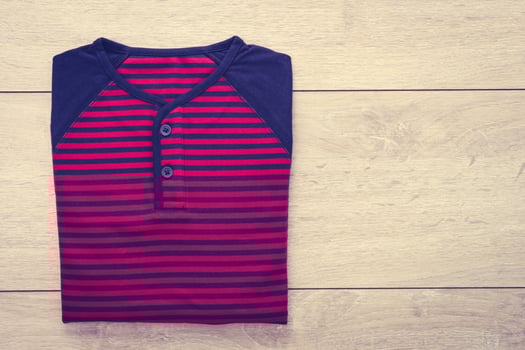 Shirt on wooden background photo