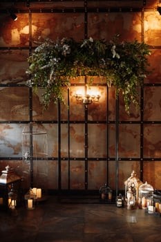 Wedding ceremony area with wood and rusty metal photo